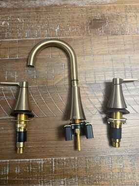 Moen Mikah Two Handle Widespread Bathroom faucet in bronzed gold